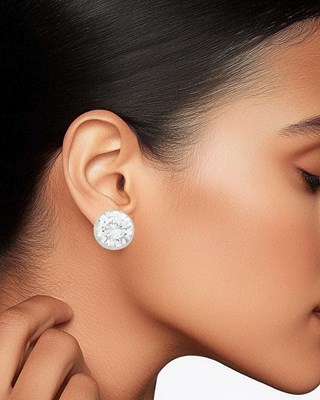 Lot 156 - Fred Leighton Pair of Platinum and Diamond Earclips with Belperron Pair of Gold Jackets