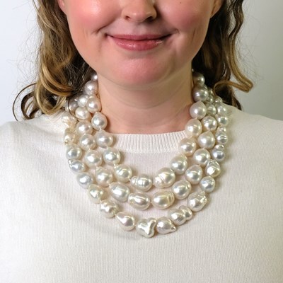 Lot 148 - Three Baroque South Sea Cultured Pearl Necklaces with White Gold and Diamond Clasps