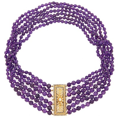 Lot 2197 - Six Strand Amethyst Bead Necklace with Gold and Diamond Clasp