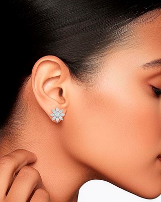 Lot 63 - Pair of Platinum and Diamond Flower Earrings