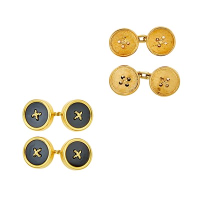 Lot 1302 - Tiffany & Co. Pair of Gold and Black Onyx Button Cufflinks and Merrin Gold Button Cufflinks