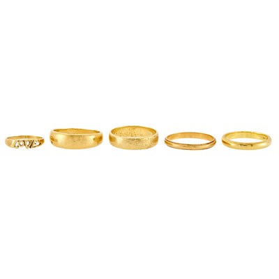 Lot 2394 - Four Gold Band Rings and Love Ring