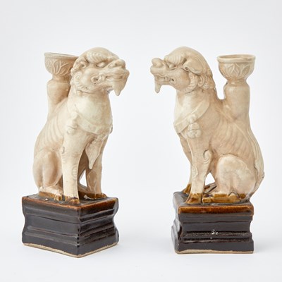 Lot 122 - A Pair of Chinese Tang-style Lion Form Ceramic Candlesticks