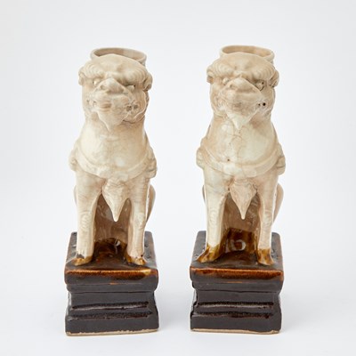 Lot 122 - A Pair of Chinese Tang-style Lion Form Ceramic Candlesticks