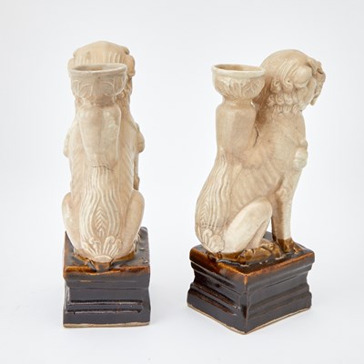 Lot 122 - A Pair of Chinese Tang-style Lion Form Ceramic Candlesticks