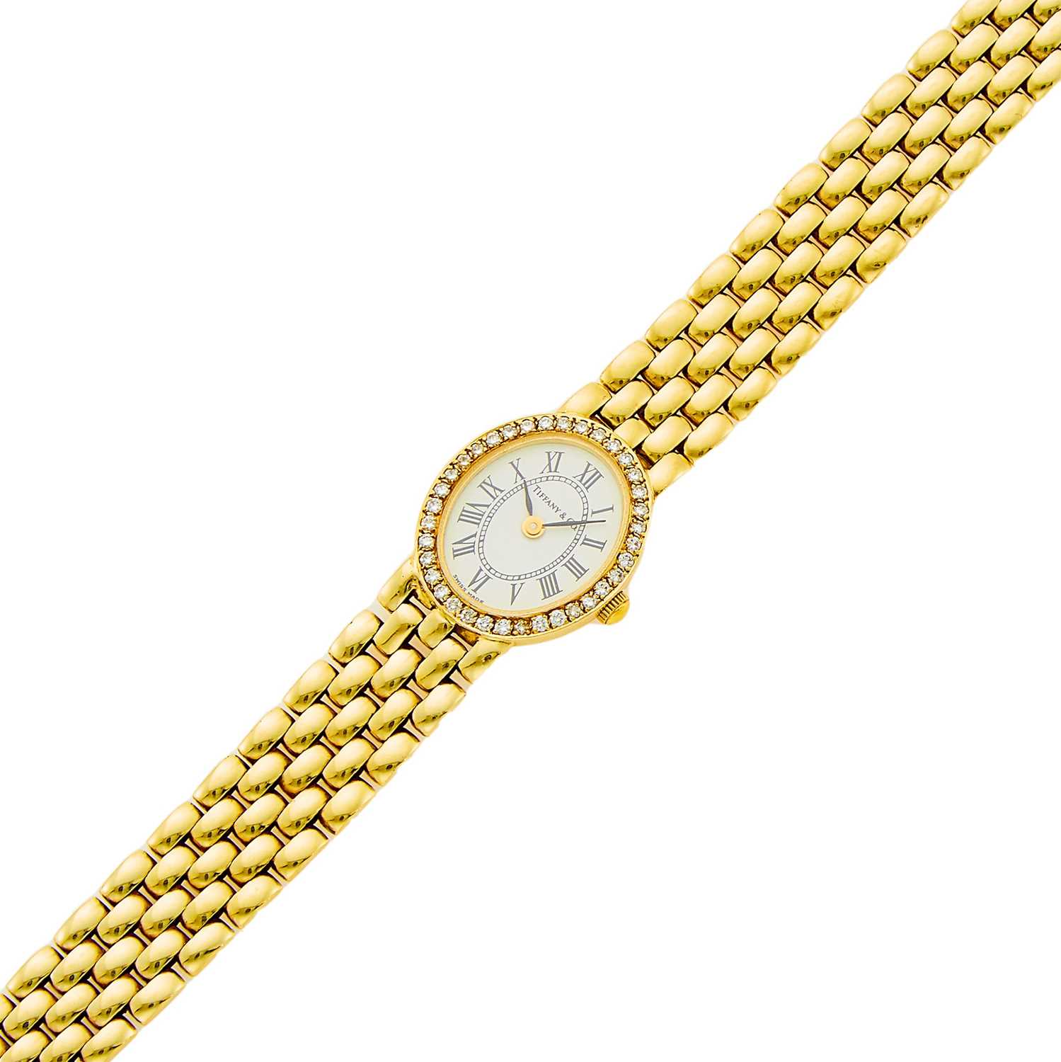 Lot 1009 - Tiffany & Co. Gold and Diamond Wristwatch