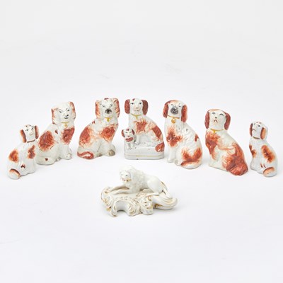 Lot 358 - Bloor Derby Porcelain Model of a Poodle and Seven Staffordshire Models of King Charles Spaniels