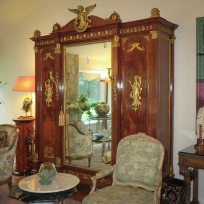 Lot 470 - Late Empire Gilt-Bronze Mounted Plum-Pudding Mahogany Mirrored Three-Door Armoire