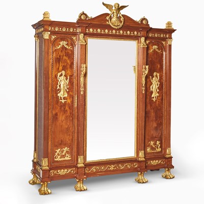 Lot 470 - Late Empire Gilt-Bronze Mounted Plum-Pudding Mahogany Mirrored Three-Door Armoire