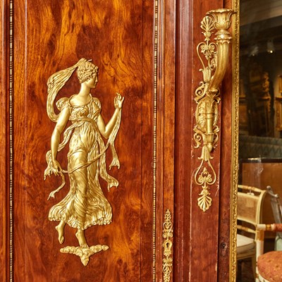 Lot 470 - Late Empire Gilt-Bronze Mounted Plum-Pudding Mahogany Mirrored Three-Door Armoire