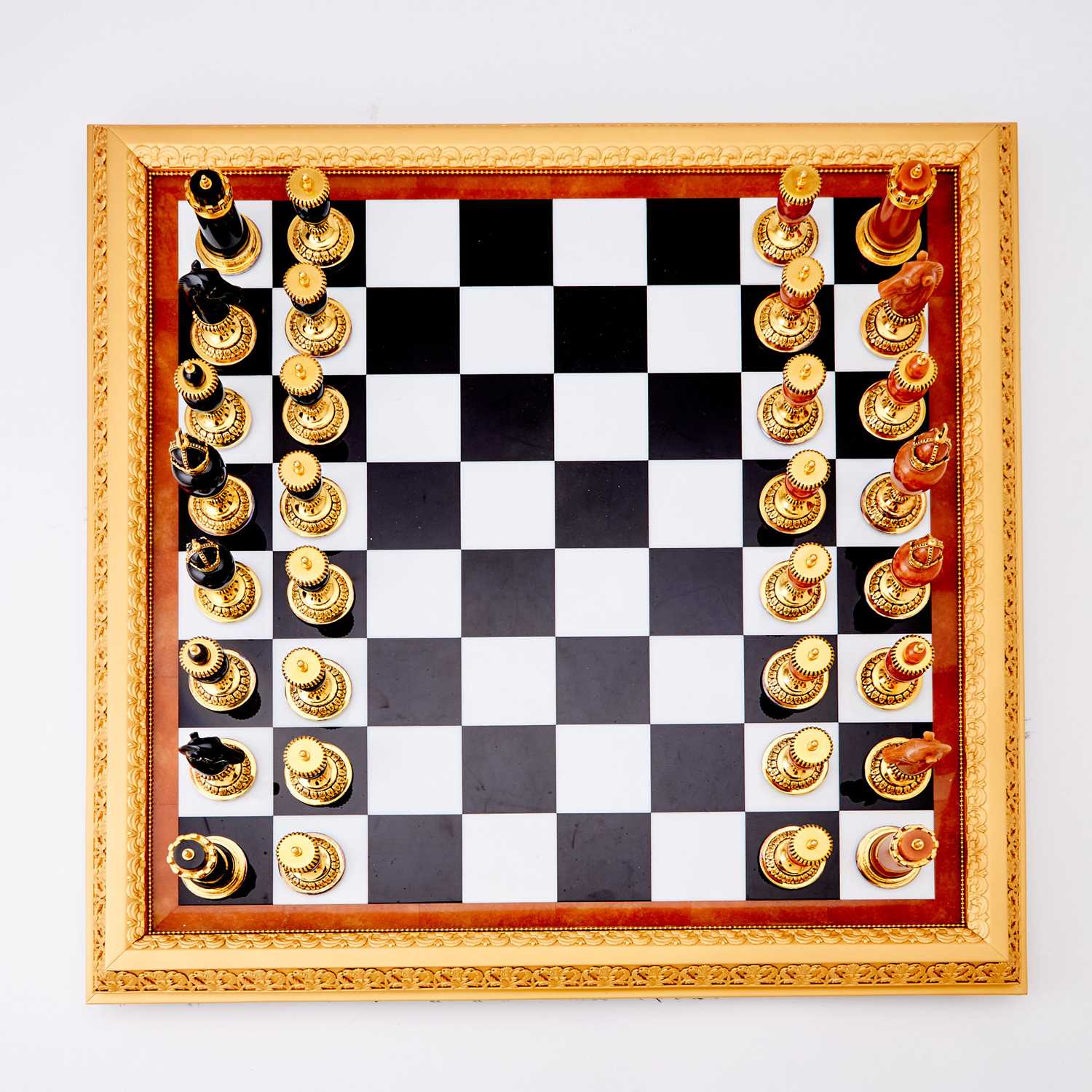 Lot 272 - Modern Fabergé 24 Karat Gold-Plated and Sterling Silver Mounted Hard Stone "Imperial" Chess Set