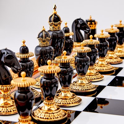 Lot 272 - Modern Fabergé 24 Karat Gold-Plated and Sterling Silver Mounted Hard Stone "Imperial" Chess Set