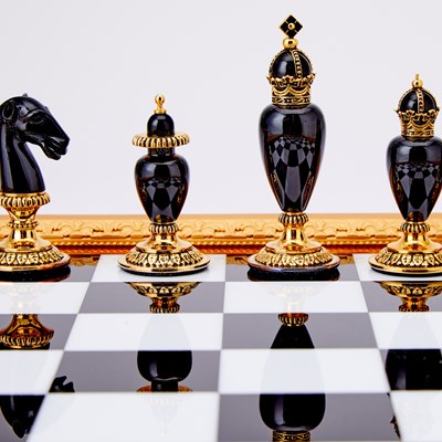 Lot 272 - Modern Fabergé 24 Karat Gold-Plated and Sterling Silver Mounted Hard Stone "Imperial" Chess Set