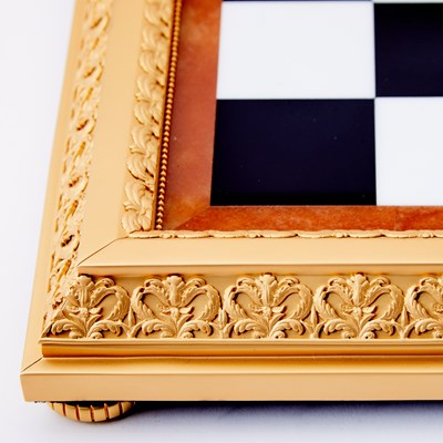 Lot 272 - Modern Fabergé 24 Karat Gold-Plated and Sterling Silver Mounted Hard Stone "Imperial" Chess Set
