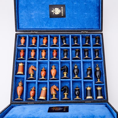 Lot 272 - Modern Fabergé 24 Karat Gold-Plated and Sterling Silver Mounted Hard Stone "Imperial" Chess Set