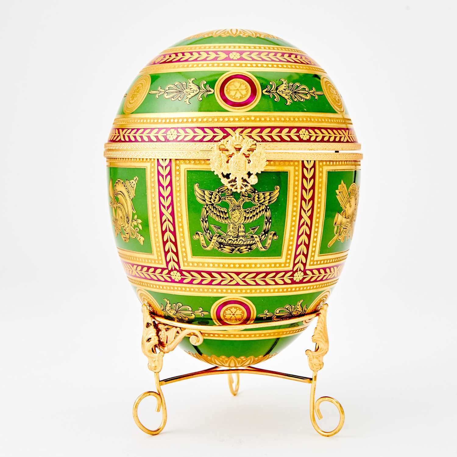 Lot 271 - Tatiana Fabergé Gilt-Metal Mounted Porcelain Egg-Form Box and Stand