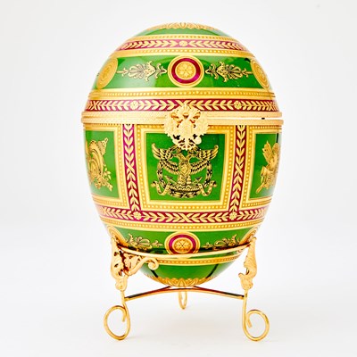 Lot 271 - Tatiana Fabergé Gilt-Metal Mounted Porcelain Egg-Form Box and Stand