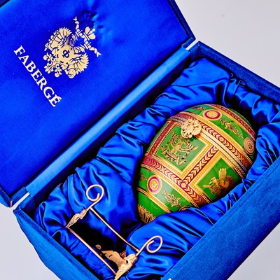 Lot 271 - Tatiana Fabergé Gilt-Metal Mounted Porcelain Egg-Form Box and Stand