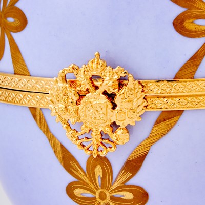 Lot 267 - Modern Fabergé Gilt-Metal Mounted Porcelain Musical Swan Egg