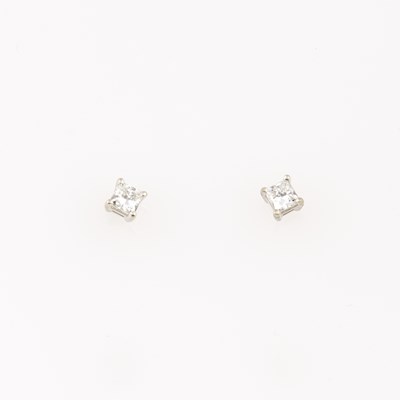 Lot 614 - Two Diamond Earrings about 0.75 ct., 14K and 10K