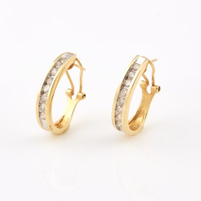 Lot 621 - Two Diamond Earrings, 16 diamonds about 1.00 ct., 14K 4 dwt.