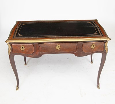 Lot 392 - Louis XV Gilt-Bronze Mounted Gilt-Tooled Leather Inlaid Kingwood Bureau Plat