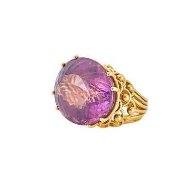 Lot 1069 - Gold and Amethyst Ring