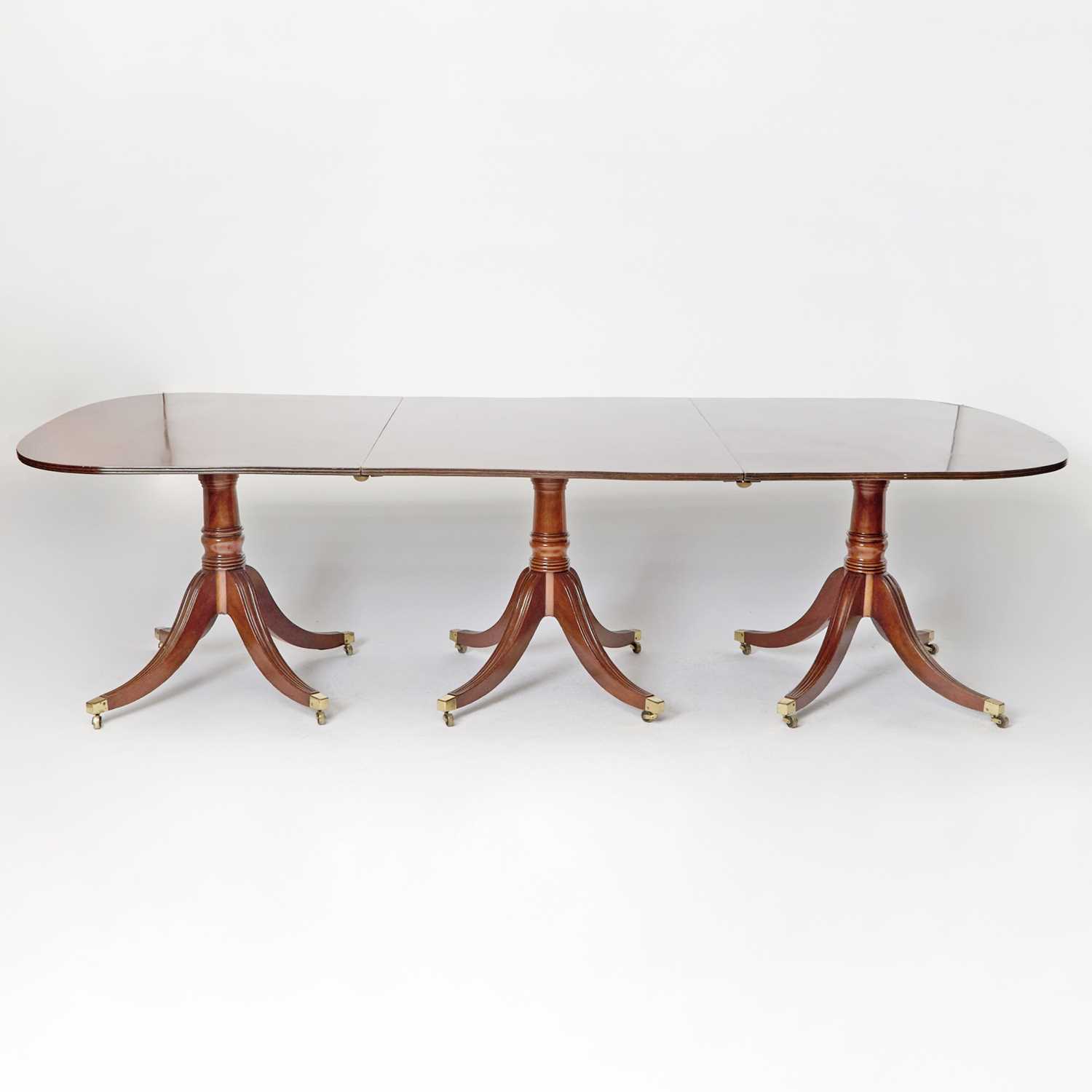 Lot 507 - George III Mahogany Triple-Pedestal Dining Table