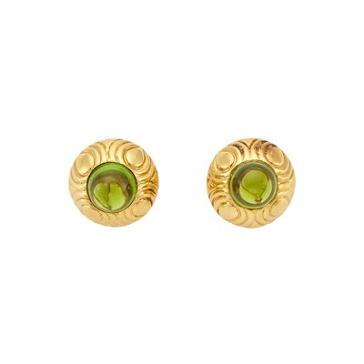 Lot 1047 - Gump's Pair of Gold and Cabochon Peridot Earclips