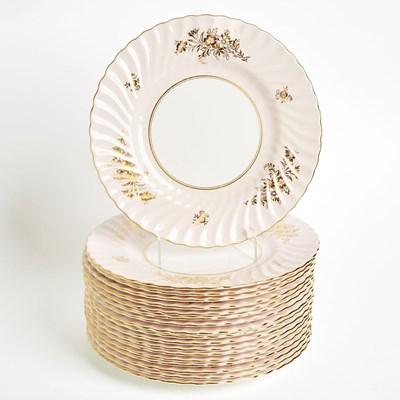 Lot 196 - Eighteen Mintons Porcelain Spiral Fluted Gilt-Decorated Blush-Pink Ground ‘Minuet’ Service Plates