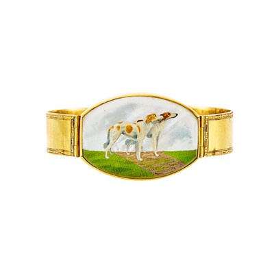 Lot 1020 - Gold, Reverse Painted Rock Crystal Intaglio and Mother-of-Pearl Hunting Dog Bangle Bracelet