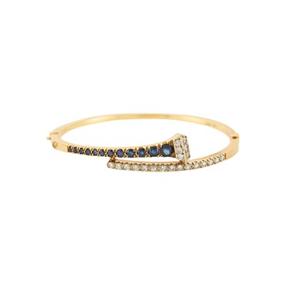 Lot 1215 - Gold, Diamond and Sapphire Nail Bangle Bracelet