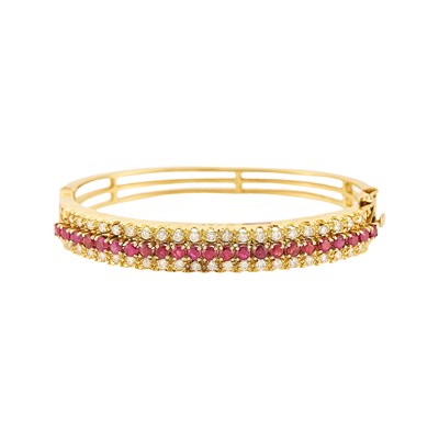 Lot 1246 - Gold, Ruby and Diamond Bangle Bracelet