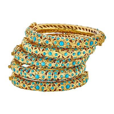 Lot 1310 - Five Indian Silver-Gilt and Turquoise Bangle Bracelets