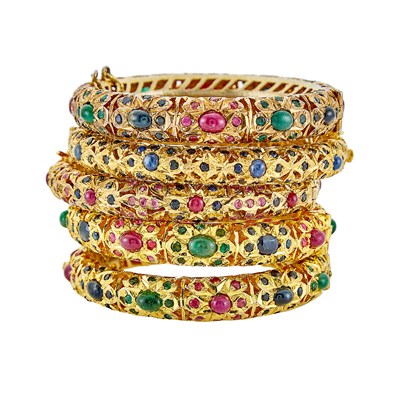 Lot 1307 - Five Indian Silver-Gilt and Gem-Set Bangle Bracelets