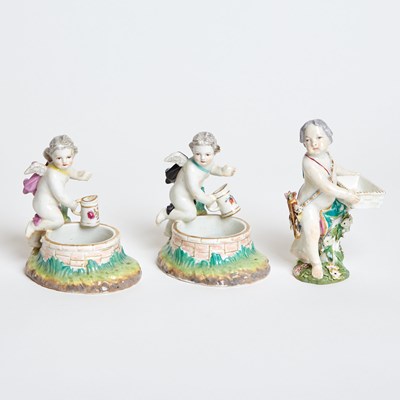 Lot 104 - Chelsea Porcelain model of Cupid as a Flower Seller