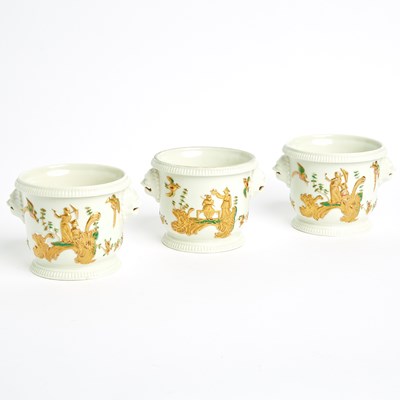 Lot 634 - Three French Porcelain Chinoiserie Mask-Handled Glass Coolers (Seaux à Verre)