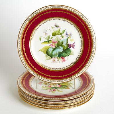 Lot 581 - Five English Porcelain Burgundy-Ground Gilt-Decorated Floral Specimen Plates