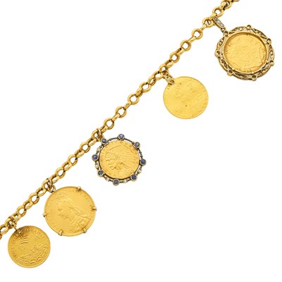 Lot 1065 - Gold, Platinum, Gold Coin, Diamond and Sapphire Charm Bracelet