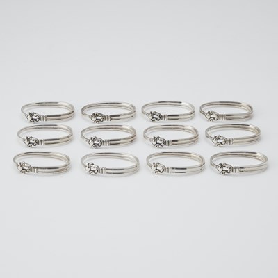 Lot 268 - Set of Twelve Georg Jensen Sterling Silver "Acorn" Pattern Napkin Rings