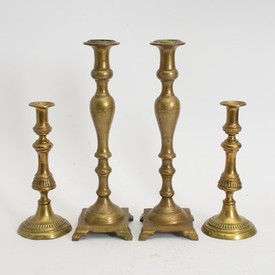 Lot 129 - Two Pairs of Brass Candlesticks