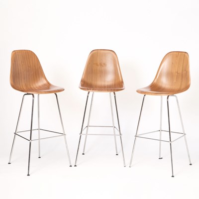 Lot 455 - Three Charles and Ray Eames for Herman Walnut and Metal Miller Bar Stools