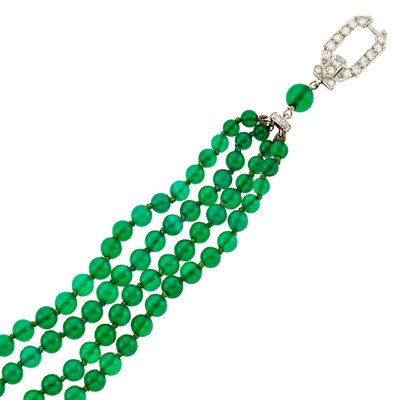 Lot 1139 - Four Strand Green Onyx Bead, Platinum and Diamond Bracelet