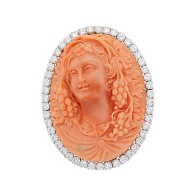 Lot 1131 - Platinum, Carved Coral and Diamond Clip-Brooch