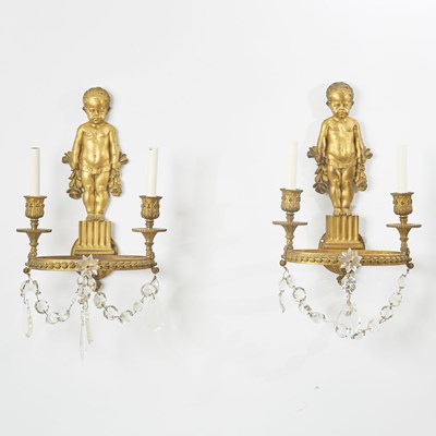 Lot 200 - Pair of Louis XVI Style Gilt-Bronze and Glass Two-Light Putti Sconces