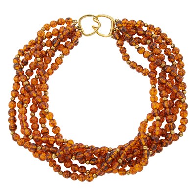 Lot 2161 - Six Strand Simulated Amber Bead Necklace