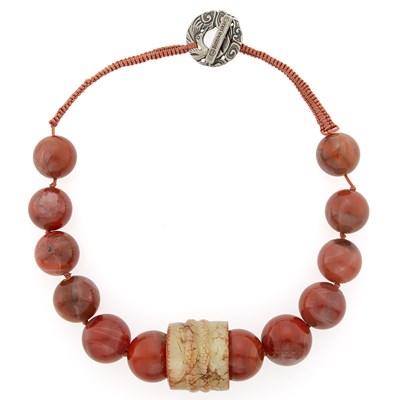 Lot 2119 - Fumiko Ukai Carnelian Bead, Carved Jade and Pewter Archer's Ring Necklace with Cord