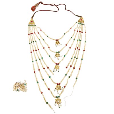 Lot 2136 - Seven Strand Freshwater Pearl, Emerald and Ruby Bead, Gold, Foil-Backed Paste and Foil-Backed White Sapphire and Synthetic Ruby Swag Necklace