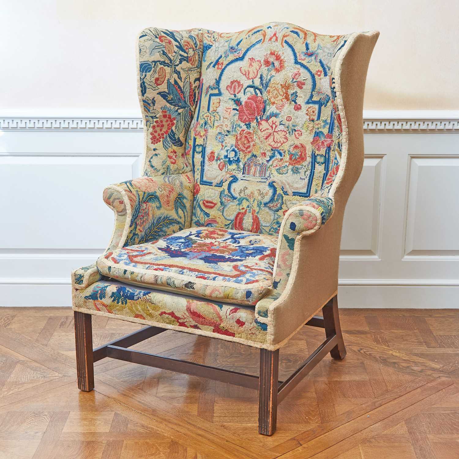 Lot 127 - George III Style Mahogany Needlework-Upholstered Wing Armchair