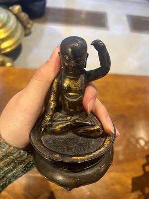 Lot 173 - A Chinese Parcel Gilt Bronze Figure of Infant Buddha on Stand